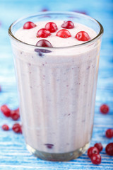 yogurt with berries on the table