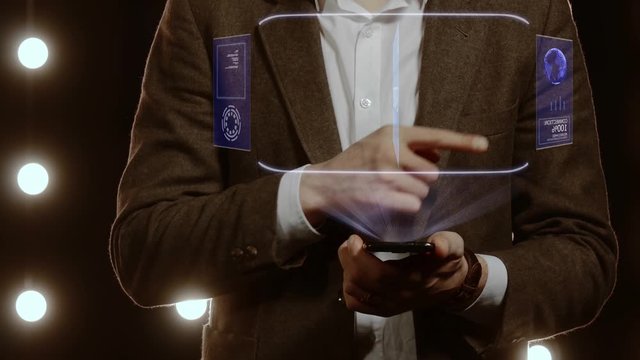 Businessman activates conceptual HUD hologram on smartphone with text E-ticket. Man in a white shirt and jacket with a holographic screen on the background of lights