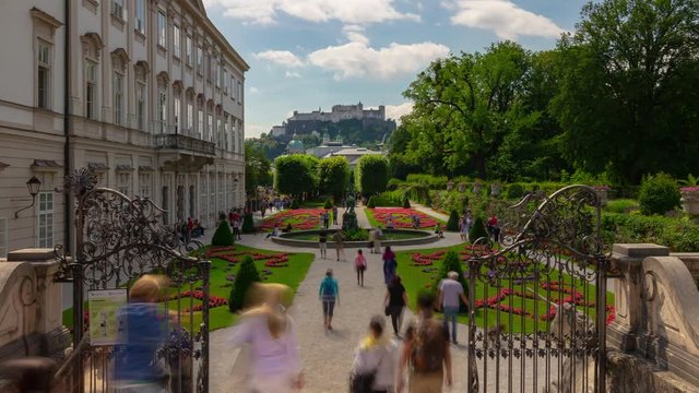 salzburg city sunny day famous tourist crowded garden panorama 4k timelapse austria  