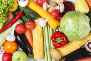 vegetables on a colored background top view. Place to insert text