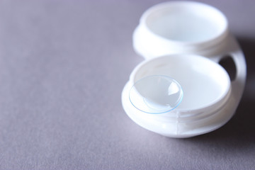 lenses for vision correction and a container for storing lenses. Contact lenses.