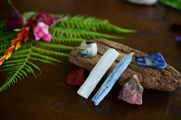 Assortment of healing crystals, like selenite, blue kyanite, red jasper, unakite, and sodalite! Macro photography of high energy, healing stones. Reiki energy healing talisman. 