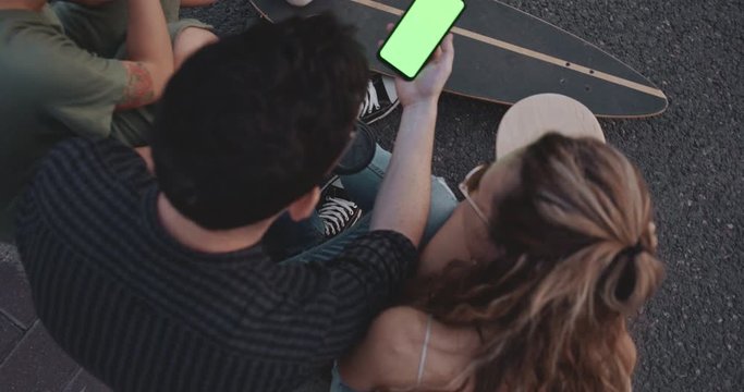 Teenager Look At Green Screen Phone