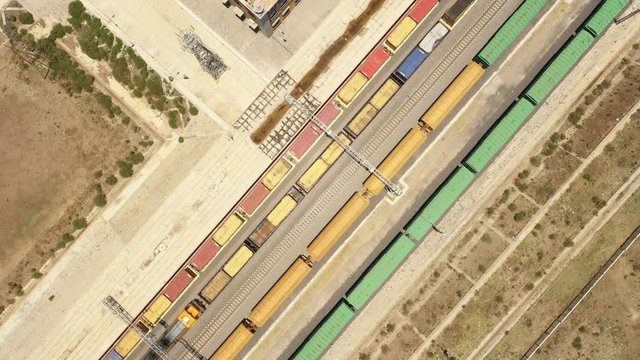 Overhead drone shot of cargo trains at Adama station on the Ethiopia - Djibouti railway line (built by Chinese corporation)