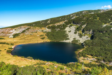 Fototapeta na wymiar Mountain summer landscape panoramic view with beautiful Yonchevo lake, Rila national park, Bulgaria