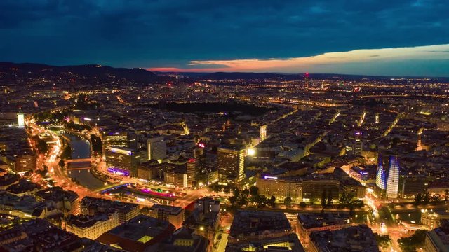sunset night illumination vienna city riverside aerial panorama 4k timelapse austria 