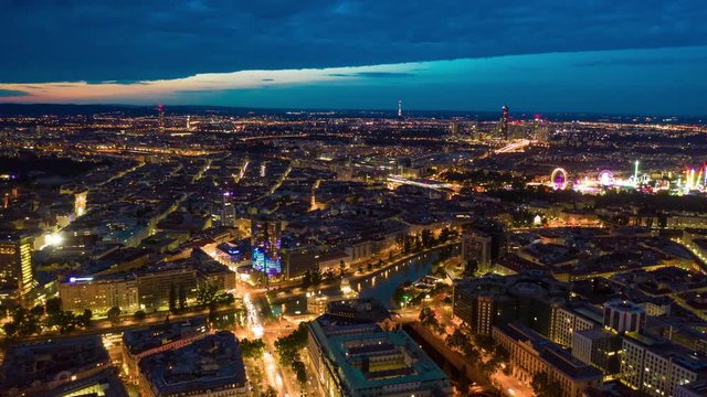 sunset night illumination vienna city riverside aerial panorama 4k timelapse austria 