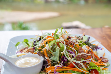 Caesar salad on a white plate