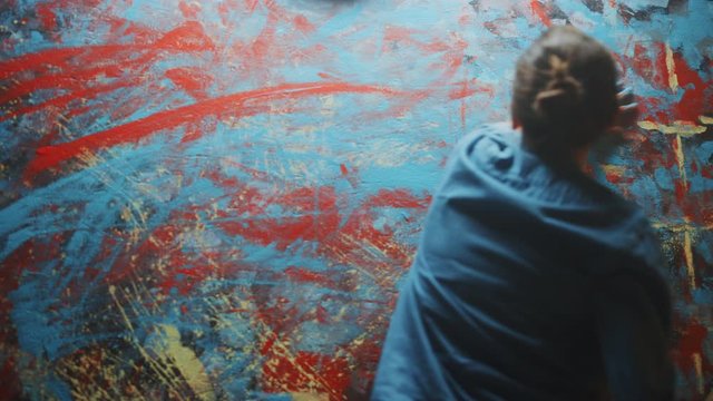 Talented Innovative Female Artist Draws with Her Hands on the Large Canvas, Using Fingers She Creates Colorful, Emotional, Sensual Oil Painting. Contemporary Painter Creating Abstract Modern Art