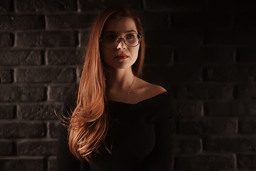 girl loft interior studio glasses / businesswoman in glasses, confidence, youth, nature.