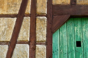 Rustic Charm: Timber Framing and a Green Door