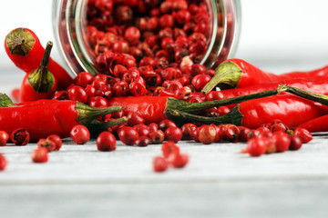 red hot bird chili pepper with pepper corns