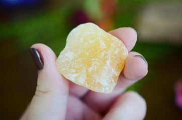 Orange Calcite. Crystals for sexuality, creativity, and optimism! Light orange calcite, Raw Calcite and Tumbled Calcite! Natural lighting, macro photography. Reiki energy healing.