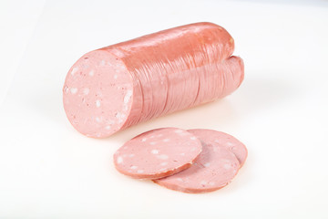 Tasty meat sausages over white background