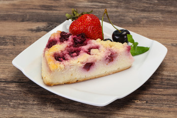 Cheesecake with cherry served strawberry