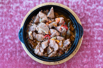 Roast in the pan. Meat dish in the pan.