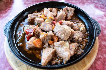 Appetizing dish with meat. Beautiful photo of a roast with meat.