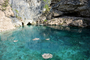 Fototapeta premium Natural Hot Springs with Vivid Green Water
