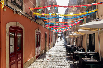 View to the Bairro Alto district in the historic center of Lisbon, traditional facades in the...