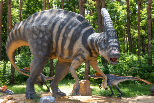 Realistic model of a Parasaurolophus against cloudy sky background. Dinosaur park in Belgorod , Russia - MAY 18, 2018