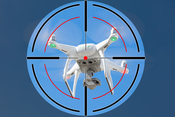 Drone flying against clear blue sky