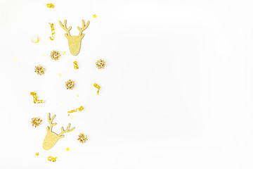 Christmas composition with golden deers
