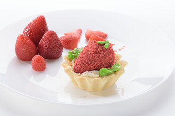 strawberry dessert on a white plate. White background. Strawberry.