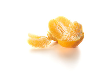  ripe orange  on a white background is divided into two parts.
