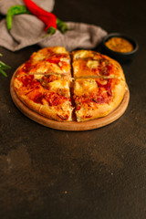 pizza, tomato sauce, cheese (pizza ingredients). hot pizza. Top view. copy space