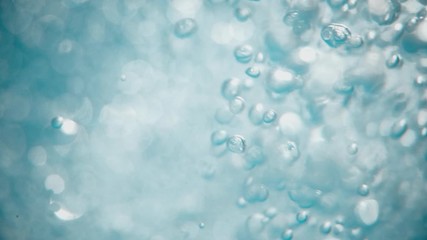 Bubbles rising to the surface. Air bubbles in water in sea (underwater shot), good for backgrounds. Slow motion.