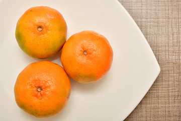 Tangerines served on the table