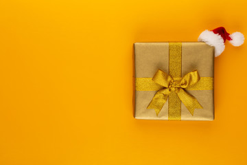 Christmas, holiday present box on red background.