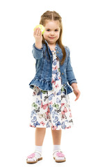 Little girl with apple. concept of a happy childhood