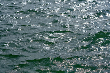 Waving and glittering sea water as a natural background. 