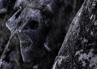 Skull face sculpture made by erosion, Vila Nova de Cerveira, Portugal. 