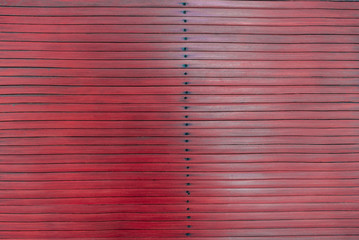 Red rustic striped wooden background. Timber style