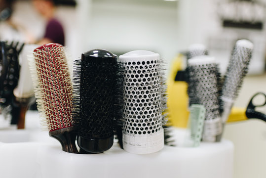 Cllose-up set of hairbrushes in a hairdresser's room