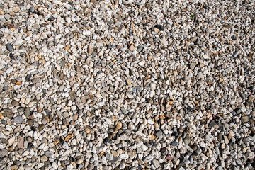 Brown stone grit scree for background. Brown gravel stone texture, granite gravel, rocks crushed for ground construction