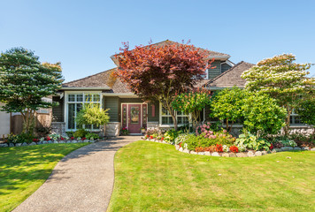 A perfect neighbourhood. Houses in suburb at Summer in the north America. Luxury houses with nice...