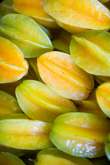 Fresh yellow carambola star fruit on display at Brazilian farmers market in Rio de Janeiro Brazil