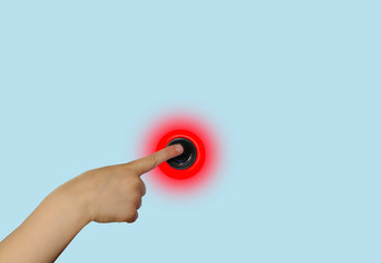 child's hand presses the button with a red light with an index finger, isolate on a yellow background, photograph, concept, close-up, copy space