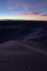 Dark purple sand dunes at twilight in Lavalle, Mendoza, Argentina