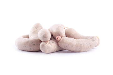 homemade raw meat sausages for barbecue on a white background isolated
