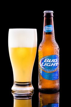 CHATHAM, NJ, UNITED STATES - JULY 21, 2014: Bottle and glass full with Bud Light beer. Bud Light, a pale lager light beer, distributed by Anheuser-Bush Inbev, is the top selling beer in United States.