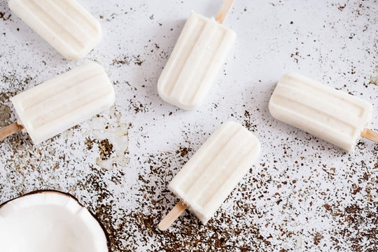 Five Coconut Yogurt Popsicles On A Table