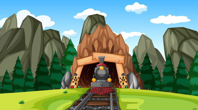 Train Exiting Tunnel In Mountain