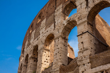 Detail of the  facade of the famous Colosseum or Coliseum also known as the Flavian Amphitheatre in...