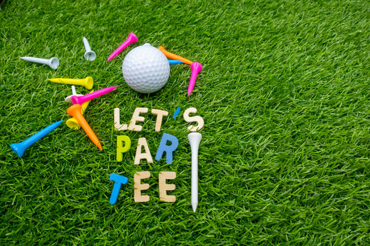 Golf let par tee party invitation for golfer party with golf ball and colourful tees on green grass