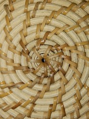 wicker basket on wooden background