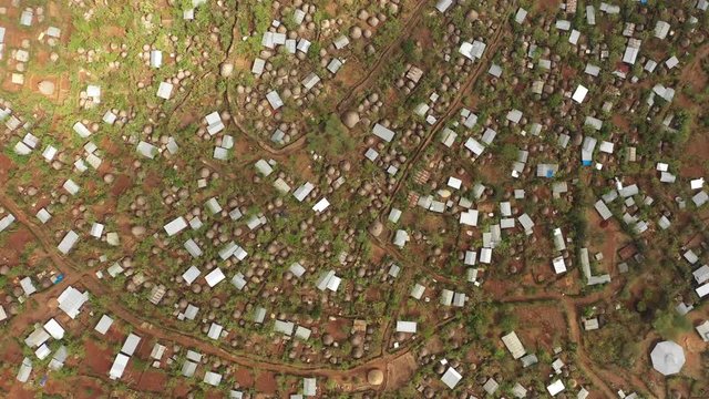Africa rural landscapes - Abstract bird's eye perspective of spectacular dense tribal village with traditional homes and gardens in Konso, South Ethiopia